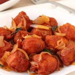 Crispy and spicy Paneer 65 tossed with curry leaves, chilies, and flavorful masala.